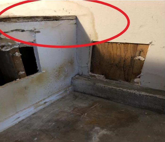 white wall with yellowing water stains