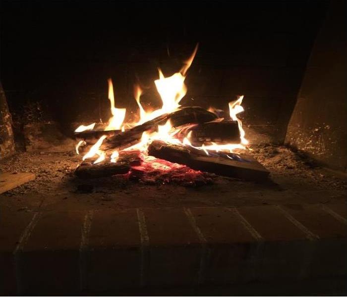 red, orange and yellow flames in the dark